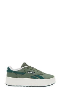 Enjoy court-inspired style in this sporty platform sneaker crafted with a perforated toe box, padded collar and topstitched logo stripes. Leather and synthetic upper/textile lining/rubber sole Imported Casual Green Sneakers With Embossed Logo, Green Synthetic Sneakers With Perforations, Fall Bathroom Decor, Concert Looks, Green Fits, Flip Flop Slippers, Sports Blazer, Platform Sneaker, Sandals Brands