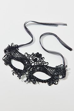 Sheer lace masquerade mask in a classic silhouette complete with soft satin ribbon ties. Features Ivy lace mask Sheer lace masquerade mask Satin ribbon tie finish Content + Care Polyester, nylon Spot clean Imported | Ivy Lace Mask in Black, Women's at Urban Outfitters Fancy Mask, Lace Masquerade Mask, Lace Masquerade Masks, Lace Skull, Lace Mask, Masquerade Mask, Ribbon Tie, Classic Silhouette, Black Fits