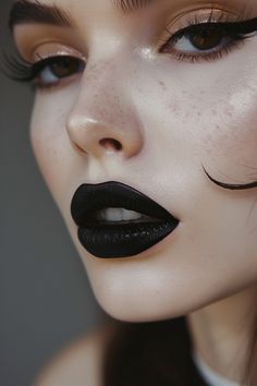 Jet black lipstick with a matte finish paired with classic, black winged eyeliner for a look of timeless elegance and sharp sophistication. Casual Black Lipstick Look, Black Lipstick Makeup Looks, Black Lipstick Aesthetic, Elegant Goth Makeup, Black Lipstick Looks, Hair Ideas For Medium, Black Lipgloss, Black Lips Makeup, Black Lipstick Look