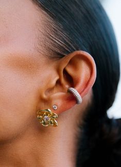 Style an effortless ear scape with our new micropave ear cuffs - no piercings required! Slide them onto the narrowest part of your ear and adjust accordingly; the cuff grips onto your ear and is comfortable for extended wear. Perfect to wear alone or stacked with multiple for a statement look. Extra cute when styled with our other micropave pieces such as our Micropave Pop Drop Earrings! See as well our Enamel Ear Cuffs here. Double Conch Piercing, Ear Scape, Double Conch, Conch Piercing Stud, Girls Keychain, Lucky Charm Necklace, Candy Necklaces, Bling Earrings, Bling Necklace