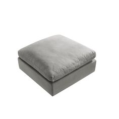 a grey square ottoman cushion on a white background