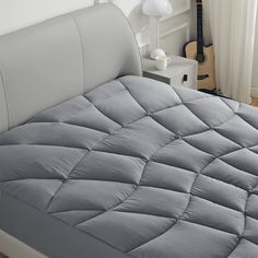 the mattress is made up and ready for someone to use it in their bed room