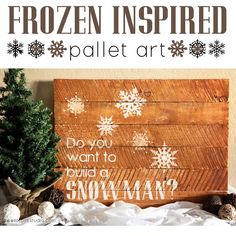 a wooden sign that says frozen inspired pallet art with snowflakes on it