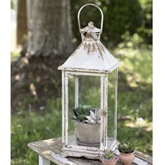 Metal & Glass Emerson Lantern For Pillar Candles-CTW Home-The Village Merchant Rustic Lantern Centerpieces, Farmhouse Decor Trends, Backyard Escape, Farmhouse Lantern, Rustic Lanterns, Lantern Centerpieces, Primitive Homes, Bridal Shower Centerpieces, Bar Wedding