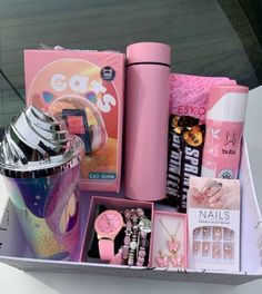 a pink box filled with lots of different items