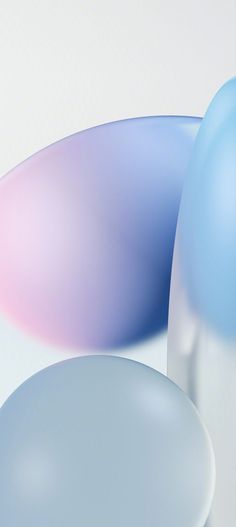 an image of three different colored balloons in the air with blurry colors on them