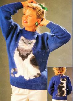 a woman wearing a sweater with a cat on it