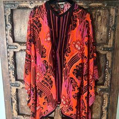 Roberto Cavalli Caftan . Fabulous Play On Color . Orange / Red With Black And Purple. The Front Has Mesh Ribbon Detailing. Removable Belt . Smoke And Pet Free Environment Note: The Authenticity Hollagram On The Inside Tag . Last Photo Same Tunic Different Color .. Show How It Looks On Red Bohemian Tunic Kimono, Red Bohemian Kimono For Festive Occasions, Red V-neck Kaftan With Vibrant Print, Red Long Sleeve Bohemian Kaftan, Elegant Red Floral Print Kaftan, Festive Red Floral Print Kaftan, Red Spring Kaftan With Vibrant Print, Spring Red Kaftan With Vibrant Print, Red Kaftan With Vibrant Print For Spring