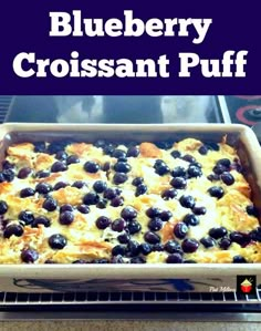 blueberry croissant puff in a baking pan with the words, blueberry croissant puff