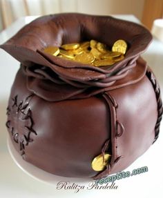 a chocolate bag with gold coins in it