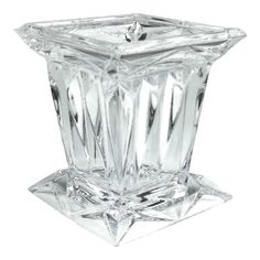 a clear glass candle holder on a white background