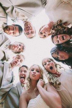 a group of people that are standing in the middle of a circle with their mouths open