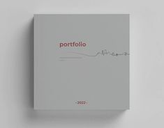 a book with the title portfolio written in red on it's cover