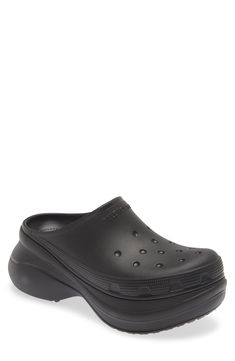 Rock your CROCS with your off-duty look in this water-resistant clog made in collaboration with Italian design house Balenciaga and set on a chunky curved sole. Synthetic upper, lining and sole Imported Men's Designer Shoes Outdoor Synthetic Platform Clogs, Modern Clogs With Round Toe For Streetwear, Modern Round Toe Clogs For Streetwear, Modern Slip-on Clogs For Streetwear, Modern Streetwear Clogs With Round Toe, Casual Clogs With Textured Sole For Outdoor, Modern Outdoor Clogs With Rubber Sole, Casual Black Clogs With Textured Sole, Functional Round Toe Clogs For Streetwear