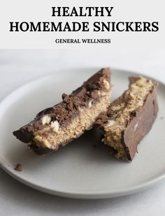 two pieces of healthy homemade snickkers on a white plate with text overlay