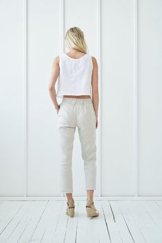 "Refresh your wardrobe with these lightweight, breezy trousers, and make them your casual go-to piece. Drawstring pants provide comfort and give laidback look. FABRIC: 100% softened Lithuanian linen COLOR: Please choose the desired color from the side menu. STYLE: Cropped linen pants with rubber all around the waist, and drawstring front. Has comfy side pockets. SIZE CHART: S Bust 31.5- 35\" (80- 88 cm) Waist 23- 26.5\" (59- 68 cm) Hips 35- 38\" (88- 96 cm) M Bust 35- 38\" (89- 96 cm) Waist 27- Linen Capris For Loungewear, Summer Cropped Bottoms With Pockets, Spring Cropped Bottoms With Elastic Waistband, Cropped Summer Bottoms With Pockets, Summer Ankle-length Sweatpants With Side Pockets, Cropped Bottoms With Pockets For Summer, Casual Beige Cropped Bottoms, White Cropped Bottoms For Loungewear, Relaxed Fit Cropped Bottoms For Summer