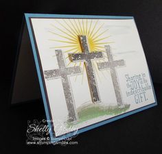 a greeting card with a cross on it