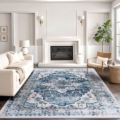 a living room filled with furniture and a large rug on top of a hard wood floor