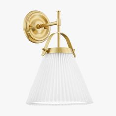 a brass wall light with white pleated glass shades on the bottom and an arm