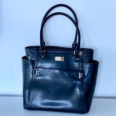 Ralph Lauren Black Calf Leather Tote. Amazing Leather!! Amazing Bag!! Great For Work. Lots Of Pockets!! Interior Section With Zipper. 2 Open Interior Sections. 3 Exterior Pockets. Approximately 14” Wide X 12” Tall. 8” Handle Drop. In Like New Condition!! No Scratches Or Scuffs Or Signs Of Wear Ralph Lauren Bags, Lots Of Pockets, Black Leather Tote, Drop In, Kate Spade Top Handle Bag, Womens Tote Bags, Leather Tote, Calf Leather, Top Handle Bag