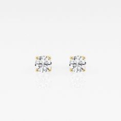 These stunning diamond stud earrings ooze as much class face up as they do in their side profile. A beautiful twisted floral design carefully incorporated in the setting holds dazzling round lab grown diamonds with four prongs. We can't wait for you to have these on! White Diamond Cut Earrings For Formal Events, Timeless White Lab Grown Diamond Earrings, Timeless White Brilliant Cut Earrings, Timeless White Lab-grown Diamond Earrings, White Single Diamond Lab Grown Earrings, Formal White Brilliant Cut Earrings, White 14k Gold Brilliant Cut Earrings, Fine Jewelry White Single Diamond Earrings, Brilliant Cut White 14k Gold Earrings