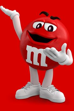 a red m & m's character is pointing to the right with his hand