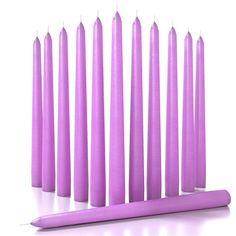 purple candles lined up next to each other