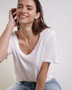 Lightweight draping that makes styling a breeze! That's what it feels like in our Everly V-Neck Tee. Crafted in an oversized fit from our Easy Slub fabrication for a soft-to-the-touch, lightweight texture that gives this classic women’s tee a perfectly imperfect finish. Deep V-neck Short sleeves Relaxed, loose silhouette Easy Slub fabrication for a burnout finish Crew Neck Tshirt, Ladies Tee Shirts, Work Looks, Round Neck Tops, Trendy Clothes For Women, Perfectly Imperfect, Womens Casual Outfits, White Tee, Ladies Tops Fashion