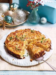 a white plate topped with a cheesy quiche