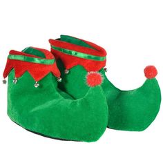 a pair of green slippers with red and green trims on the bottom, sitting next to each other