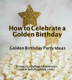 a birthday cake with white frosting and gold stars on top that says how to celebrate a golden birthday party ideas