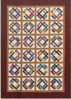 a quilt made with different colored squares