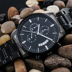 A personalized gift that can withstand constant use, this “Customized Black Chronograph Watch” is the perfect gift for all the special men in your life. From a thoughtful groomsmen gift, an anniversary memento, or a long-lasting keepsake for Father’s Day - to so much more. Featuring a three-eye decoration, calendar function, and luxury pointer in a waterproof and scratch-proof vessel. Personalize the back of the watch in Roboto font within 20 characters per line. Made from high-quality Stainless Engraved Watch, Personalized Watches, Watch Engraving, Anniversary Gifts For Husband, Groomsmen Gift, Watches Unique, Custom Watch, Luxury Boxes, Watch Gifts