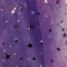 the fabric has stars on it and is purple