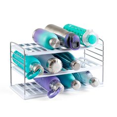 three tiered storage rack with toothbrushes and shampoos in it on a white background