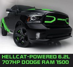 a black dodge ram truck with neon green lettering