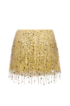 This product is on pre-order. Estimated shipping date late October. The Yasmin Hand Beaded Mini Skirt in Gold by ASTA RESORT. A myriad of sparkling sequins and cascading beads take flight off a base of silk linen. The skirt features a side zip closure and fitted waistline. Hand Embroidered Invisible zipper closure Fitted waistline Fully lined Fits true to size Made in India. Summer Party Skirt With Beaded Fringe, Summer Evening Skirt With Contrast Sequin, Embellished Evening Skirt For Summer, Glamorous Embellished Mini Skirt For Cocktail, Embellished Skirt For Party Season, Summer Cocktail Skirt With Contrast Sequin, Gold Embellished Evening Bottoms, Embellished Mini Skirt For Evening Party, Embellished Mini Skirt For Party Evenings