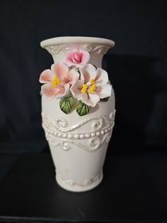 This stunning vintage vase is crafted from high-quality porcelain and features delicate pink rose leaves and small flowers on a white background. Measuring at 5.5 inches in height, this vase is the perfect addition to any collection. Its unique pattern makes it stand out from other vases, while its vintage style adds a touch of elegance to any room. This beautiful vase is in great condition, with no chips or damage. It would make a wonderful gift for any collector or lover of vintage decor. Use Cool Vases, Pretty Vase, Mini Vases, Pink Vase, Pink Home Decor, Rose Leaves, White Vase, Vintage Vase, Pottery Crafts