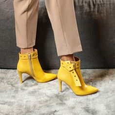 With sleek design and bold color choice these booties will steal the spotlight wherever you go .................#ankleboots #elegantankleboots #fall #winter #fashion #shoes #booties #stylish #style #elegant Shoe Stretcher, Yellow Heels, High Heel Boots Ankle, Pointed Toe Heels, Orange Leather, Heel Type, Heeled Ankle Boots, Design Color, Beautiful Shoes