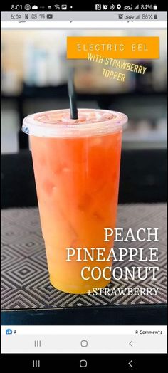 an orange drink sitting on top of a table next to a strawberries cup and the words peach pineapple coconut strawberry