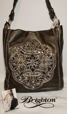 BRIGHTON ANJU PEWTER MASTERPIECE COL. SHOULDERBAG PURSE JEWELED.THIS IS A BEAUTIFUL BAG . •HIGHT 12" •WIDTH 12" •DEPTH 4" •STRAP DROP 10.5" BRIGHTON  ANJU MASTERPIECE PEWTER BEADED EMBELLISHED SOFT LEATHER BAG   FROM BRIGHTON MASTERPIECE COLLECTION   COLOR IS PEWTER WITH SILVER TONE HARDWARE   BEAUTIFUL BEADED JEWELS IN FLORAL SHAPE ON FRONT   EXTERIOR HAS SLIP POCKET NICE SOFT LEATHER WITH BRAIDED STRAP WITH A 10 1/2" STRAP DROP MAGNETIC CLOSURE INTERIOR HAS 2 ZIPPER COMPARTMENTS & 2 SMALL SLIP Elegant Silver Rectangular Hobo Bag, Silver Elegant Rectangular Hobo Bag, Silver Rectangular Elegant Hobo Bag, Elegant Silver Hobo Bag, Elegant Silver Hobo Shoulder Bag, Elegant Silver Hobo Bag With Silver-tone Hardware, Luxury Silver Hobo Shoulder Bag, Silver Hobo Bag With Silver-tone Hardware For Evening, Formal Silver Embellished Shoulder Bag