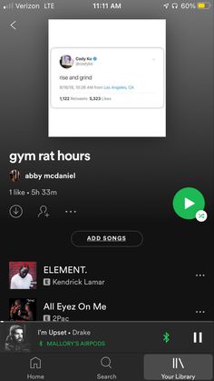 an iphone screen with the text gym rat hours on it and music player in the background