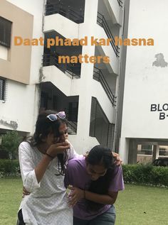 three girls hugging each other in front of a building with the words daati phad kartasana matters matters matter