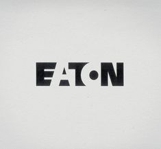 the word eaton is written in black and white