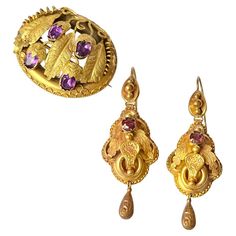 These exquisite brooch and earring set holds so much delicate detail. The gold is sculpted into textured leaves, swirls and rope twists. The main event is the pretty amethyst stones. Earring Dimensions: 52x18mm Brooch Dimensions: 27x33mm Weight: 8.5g Rope Twists, Victorian Drop Earrings, Art Deco Drop Earrings, Red Tourmaline, Amethyst Stones, Gold Brooch, Main Event, Cameo Brooch, Bird Brooch