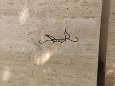 graffiti on the side of a building that says hobok written in black ink