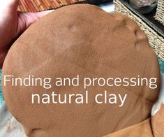 a close up of a person holding a clay with the words finding and processing natural clay