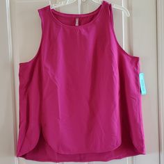 New With Tags ~ Never Worn Womens Mta Sports Workout Tank Top Size Medium Or 2x Color: Magenta Rounded Neckline With Elasticized Trim Elasticized Trim On Armholes Graduated Hemline With Side Vents 52% Polyester 38% Recycled Polyester 10% Spandex Machine Wash Machine Wash Sleeveless Sports Top For Summer, Sleeveless Gym Top For Spring, Sleeveless Athleisure Tops For Summer, Spring Gym Tank Tops, Spring Athleisure Tank Top, Spring Athleisure Sleeveless Tank Top, Sleeveless Athleisure Tank Top For Spring, Athleisure Sleeveless Tank Top For Spring, Sporty Sleeveless Tops For Spring