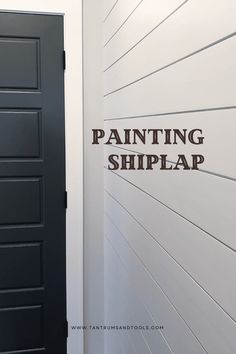 the words painting shiplap are painted on a wall next to an open door