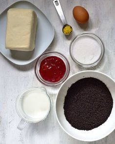 ingredients to make cake sitting on a table